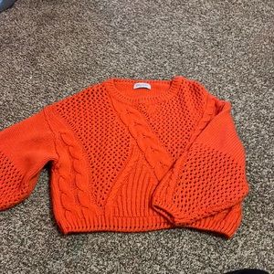 Knit sweater, three quarter sleeves.